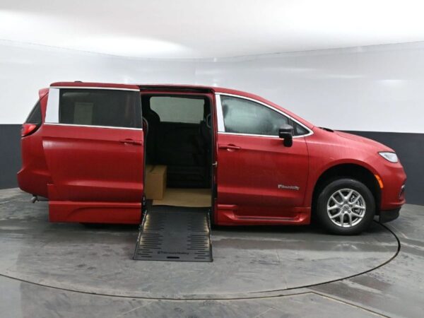 Red Chrysler Pacifica with BraunAbility Side Entry Automatic Fold Out conversion