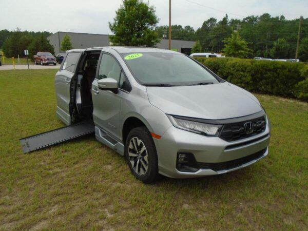 Silver Honda Odyssey with BraunAbility Side Entry Automatic In Floor conversion
