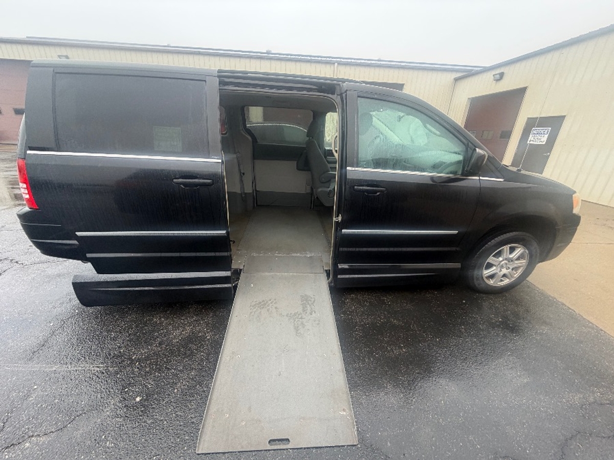 Black Chrysler Town and Country with Vantage Mobility Side Entry Automatic In Floor conversion