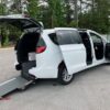 White Chrysler Pacifica with Driverge Rear Entry Manual Fold Out conversion