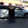 White Chrysler Pacifica with Driverge Side Entry Automatic Fold Out conversion