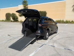 Black Toyota Sienna with Driverge Rear Entry Manual Fold Out conversion