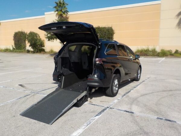 Black Toyota Sienna with Driverge Rear Entry Manual Fold Out conversion