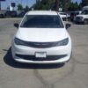 White Chrysler Voyager with Driverge Side Entry Automatic Fold Out conversion