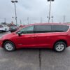 Red Chrysler Pacifica with Driverge Side Entry Automatic Fold Out conversion