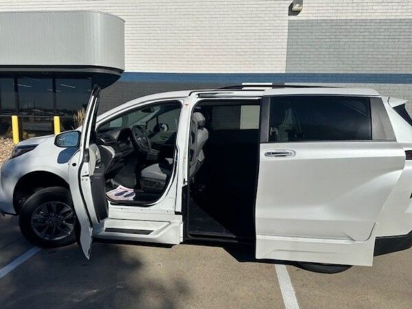 White Toyota Sienna with BraunAbility Side Entry Automatic Fold Out conversion