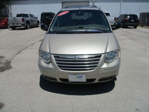 Gold Chrysler Town and Country with BraunAbility Side Entry Automatic Fold Out conversion
