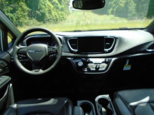White Chrysler Pacifica with BraunAbility Side Entry Automatic Fold Out conversion