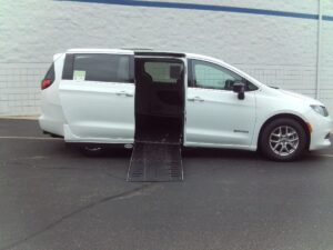 White Chrysler Voyager with Driverge Side Entry Automatic Fold Out conversion