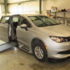 Silver Chrysler Voyager with BraunAbility Side Entry Automatic In Floor conversion