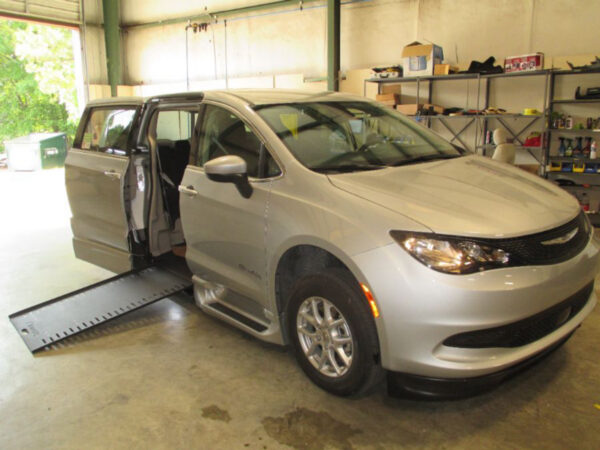 Silver Chrysler Voyager with BraunAbility Side Entry Automatic In Floor conversion