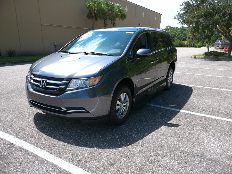 Grey Honda Odyssey with Vantage Mobility Side Entry Automatic In Floor conversion