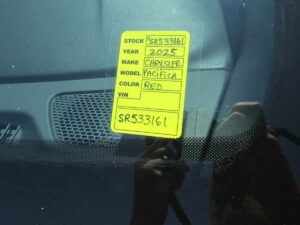 Red Chrysler Pacifica with BraunAbility Side Entry Automatic Fold Out conversion