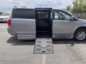 Silver Dodge Grand Caravan with BraunAbility Side Entry Automatic Fold Out conversion
