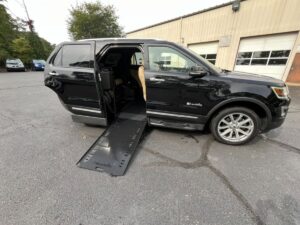 Black Ford Explorer with BraunAbility Side Entry Automatic In Floor conversion