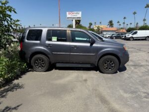 Silver Honda Pilot with Freedom Motors Rear Entry Manual Fold Out conversion