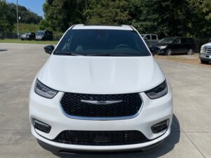 White Chrysler Pacifica with BraunAbility Side Entry Automatic Fold Out conversion