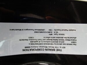 Black Chrysler Voyager with BraunAbility Side Entry Automatic Fold Out conversion