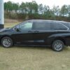 Black Toyota Sienna with Driverge Rear Entry Manual Fold Out conversion
