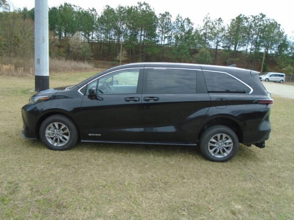 Black Toyota Sienna with Driverge Rear Entry Manual Fold Out conversion
