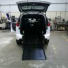 White Chrysler Voyager with FR Conversions Rear Entry Manual Fold Out conversion