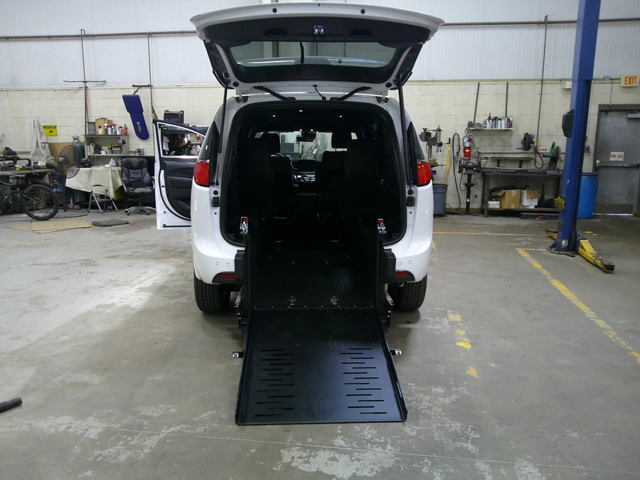 White Chrysler Voyager with FR Conversions Rear Entry Manual Fold Out conversion