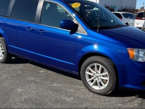 Blue Dodge Grand Caravan with Adaptive Vans Side Entry Automatic Fold Out conversion