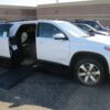 White Chevrolet Traverse with BraunAbility Side Entry Automatic In Floor conversion