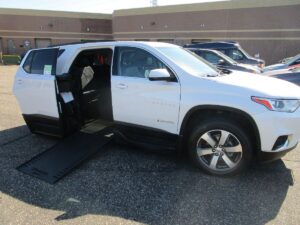 White Chevrolet Traverse with BraunAbility Side Entry Automatic In Floor conversion