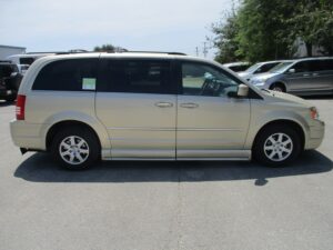 White Chrysler Town and Country with BraunAbility Side Entry Automatic Fold Out conversion