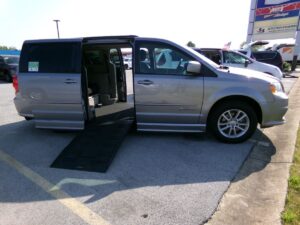 Silver Dodge Grand Caravan with BraunAbility Side Entry Automatic Fold Out conversion