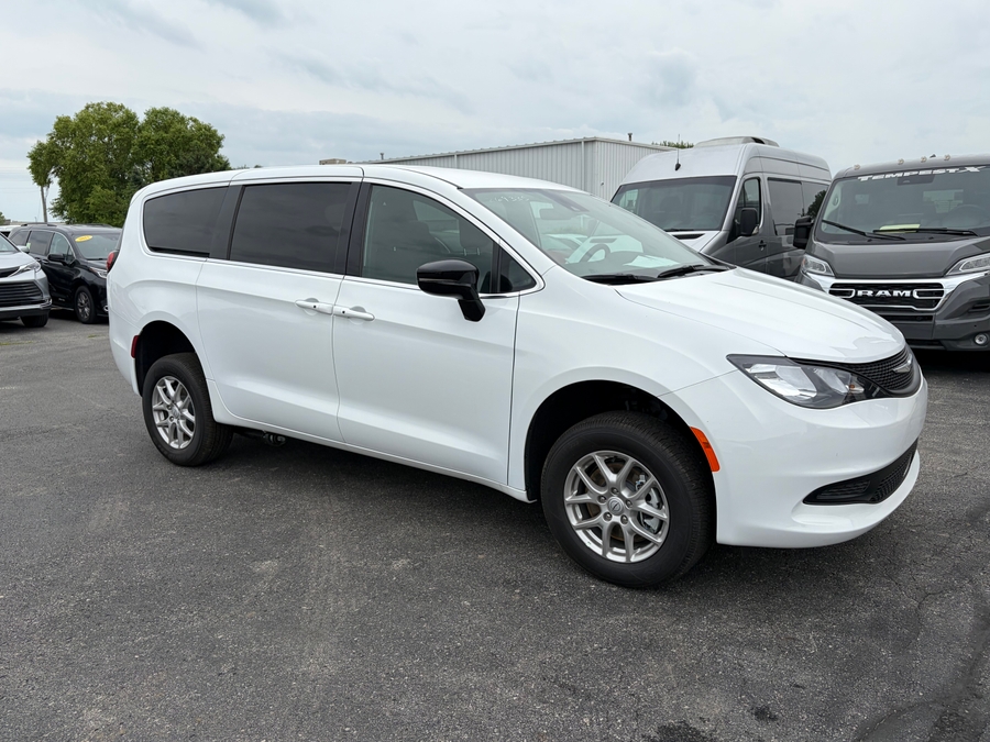 White Chrysler Voyager with FR Conversions Rear Entry Manual Fold Out conversion