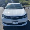 White Chrysler Voyager with Driverge Side Entry Automatic Fold Out conversion