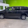 Black Dodge Grand Caravan with Adaptive Vans Side Entry Automatic Fold Out conversion