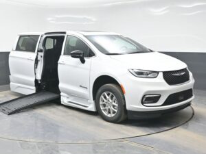 White Chrysler Pacifica with BraunAbility Side Entry Automatic Fold Out conversion