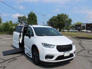 White Chrysler Pacifica with BraunAbility Side Entry Automatic In Floor conversion