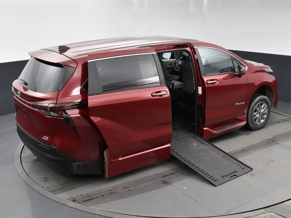 Red Toyota Sienna with BraunAbility Side Entry Automatic In Floor conversion