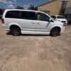 White Dodge Grand Caravan with Adaptive Vans Side Entry Automatic Fold Out conversion