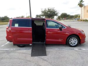 Red Chrysler Pacifica with Driverge Side Entry Automatic Fold Out conversion