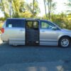 Silver Dodge Grand Caravan with BraunAbility Side Entry Automatic Fold Out conversion