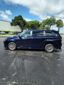 Blue Toyota Sienna with Driverge Rear Entry Manual Fold Out conversion