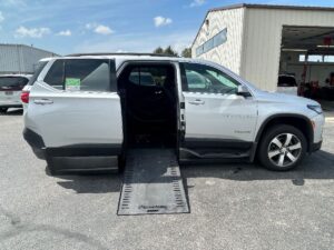 Silver Chevrolet Traverse with BraunAbility Side Entry Automatic In Floor conversion