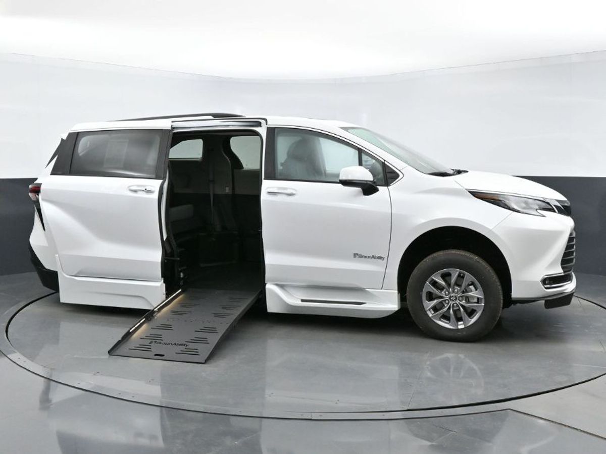 White Toyota Sienna with BraunAbility Side Entry Automatic Fold Out conversion