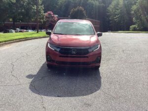 Red Honda Odyssey with BraunAbility Side Entry Automatic In Floor conversion