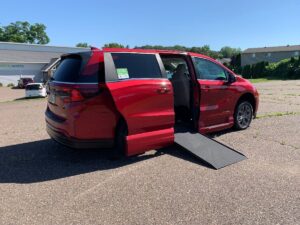Red Honda Odyssey with Vantage Mobility Side Entry Automatic In Floor conversion