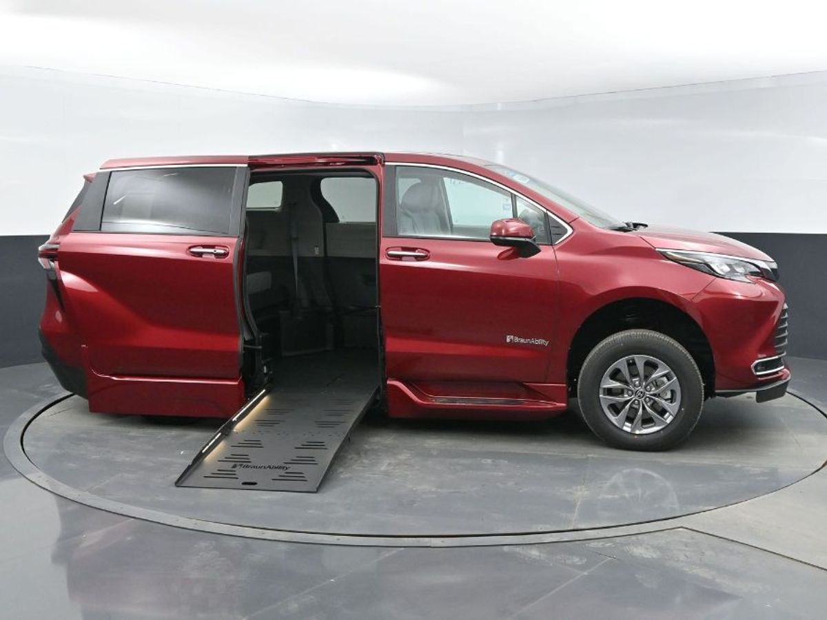 Red Toyota Sienna with BraunAbility Side Entry Automatic Fold Out conversion