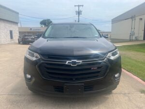 Black Chevrolet Traverse with BraunAbility Side Entry Automatic In Floor conversion