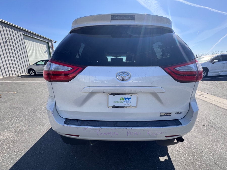 White Toyota Sienna with Vantage Mobility Side Entry Automatic In Floor conversion