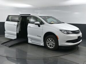 White Chrysler Voyager with BraunAbility Side Entry Automatic Fold Out conversion
