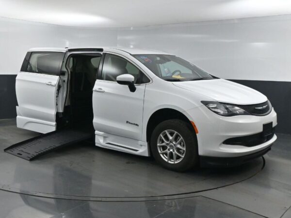 White Chrysler Voyager with BraunAbility Side Entry Automatic Fold Out conversion